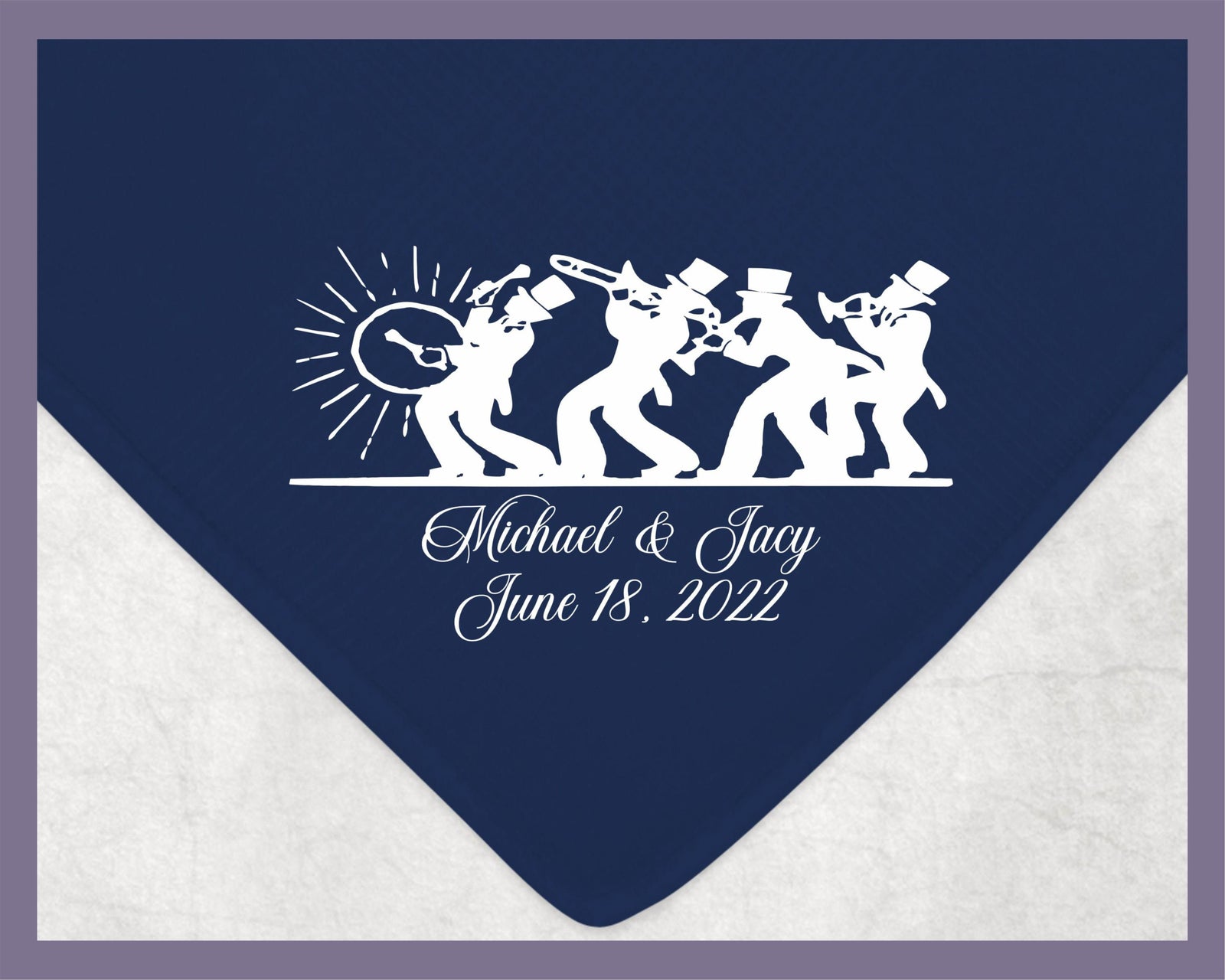 May include: A navy blue blanket with a white silhouette of a marching band playing instruments. The text 'Michael & Jacy June 18, 2022' is below the band.
