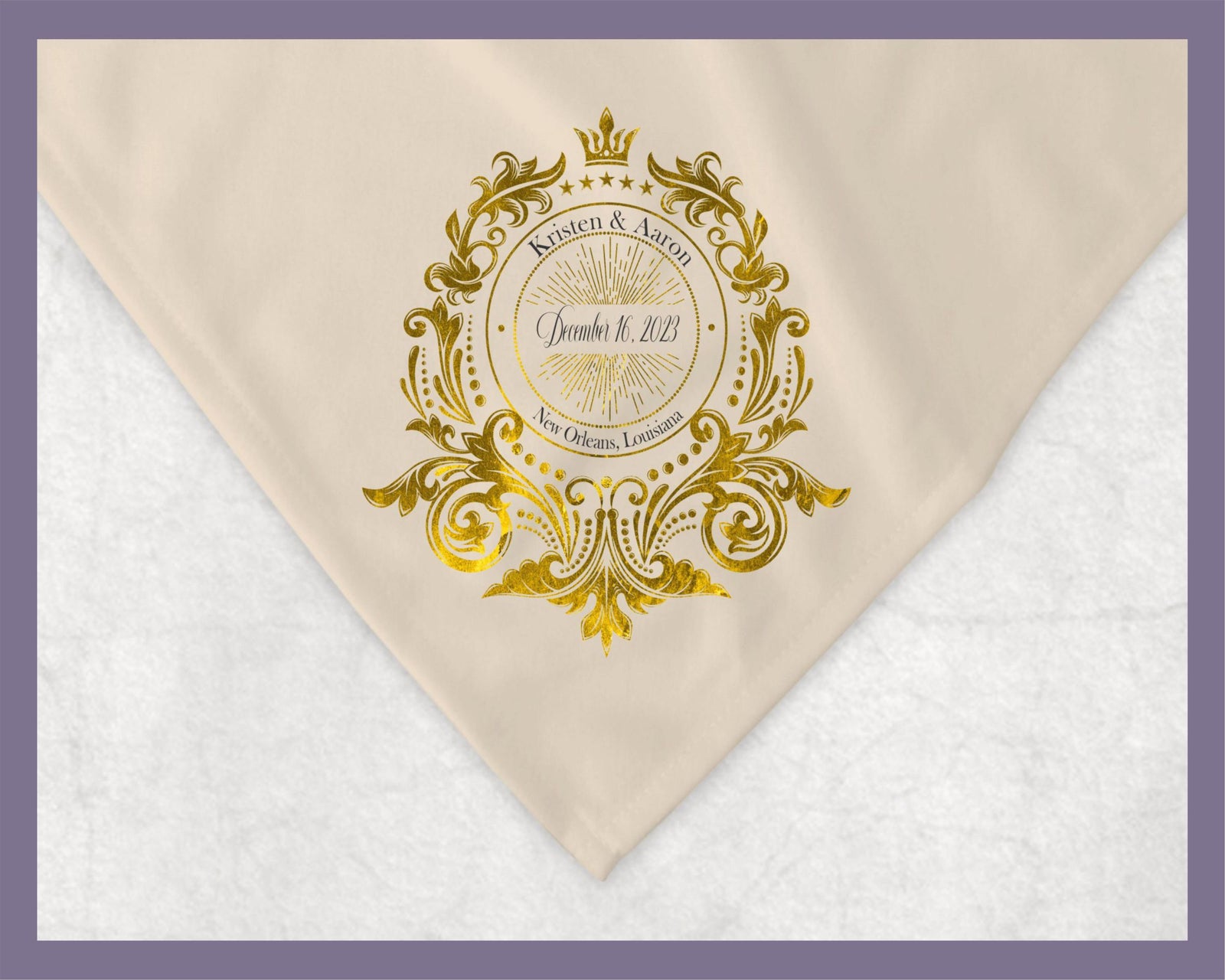 May include: A gold and white wedding blanket with a decorative design. The design includes a crown, stars, and the words 'Kristen & Aaron', 'December 16, 2023', and 'New Orleans, Louisiana'.