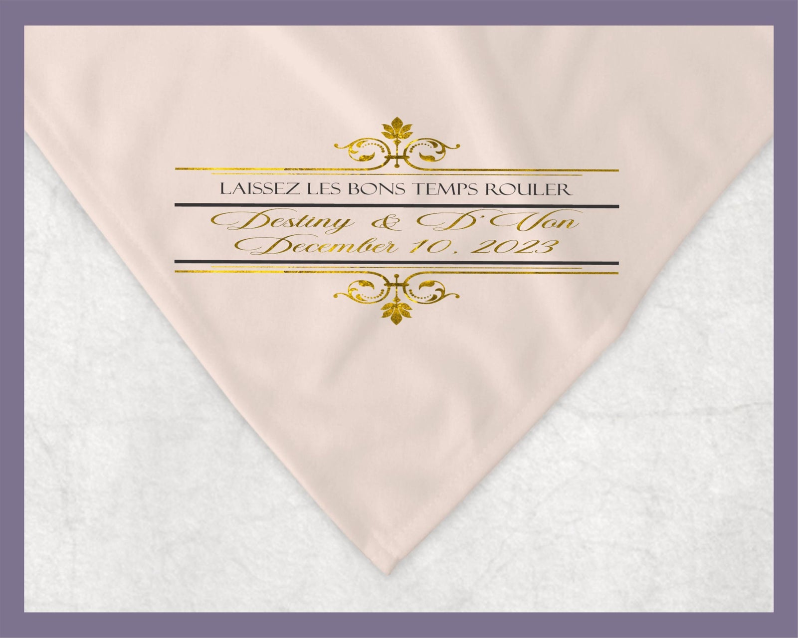 May include: A pink and white blanket with gold lettering that reads 'LAISSEZ LES BONS TEMPS ROULER' and 'Destiny & D'Von December 10, 2023'.