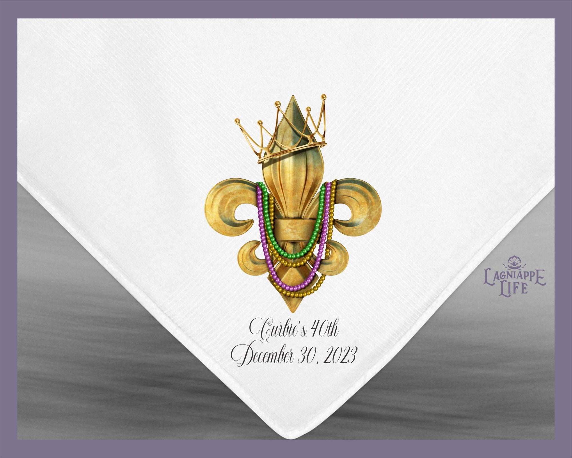 a white napkin with a gold crown on it