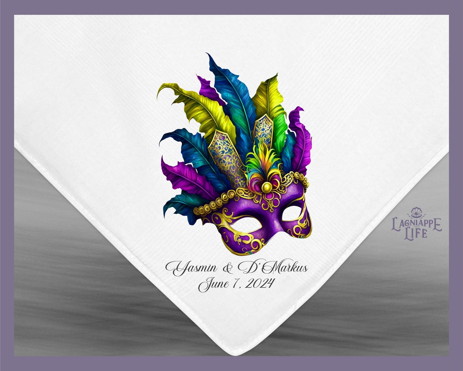 a purple mask with feathers on a white napkin