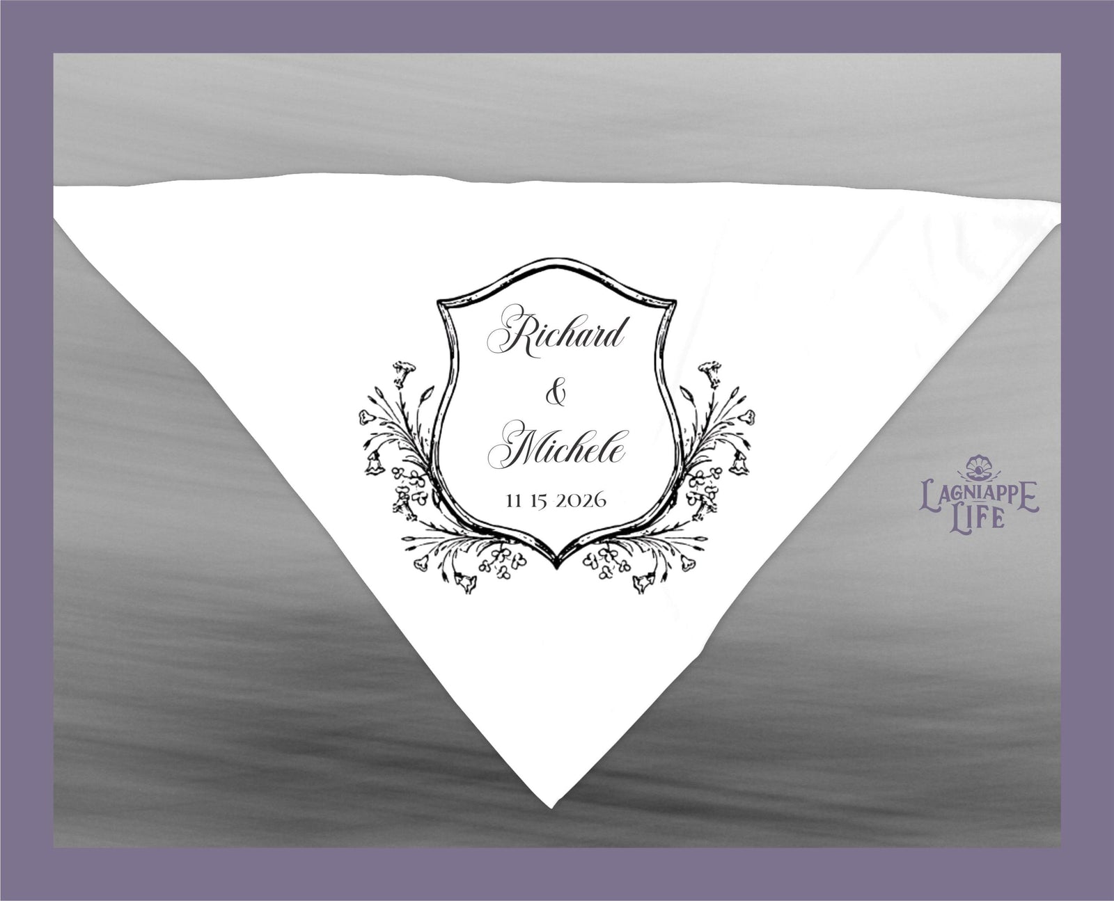 May include: A white wedding napkin with a black and white crest design. The crest features a shield with the text 'Richard & Michele' and the date '11 15 2026'. The crest is surrounded by a floral design.