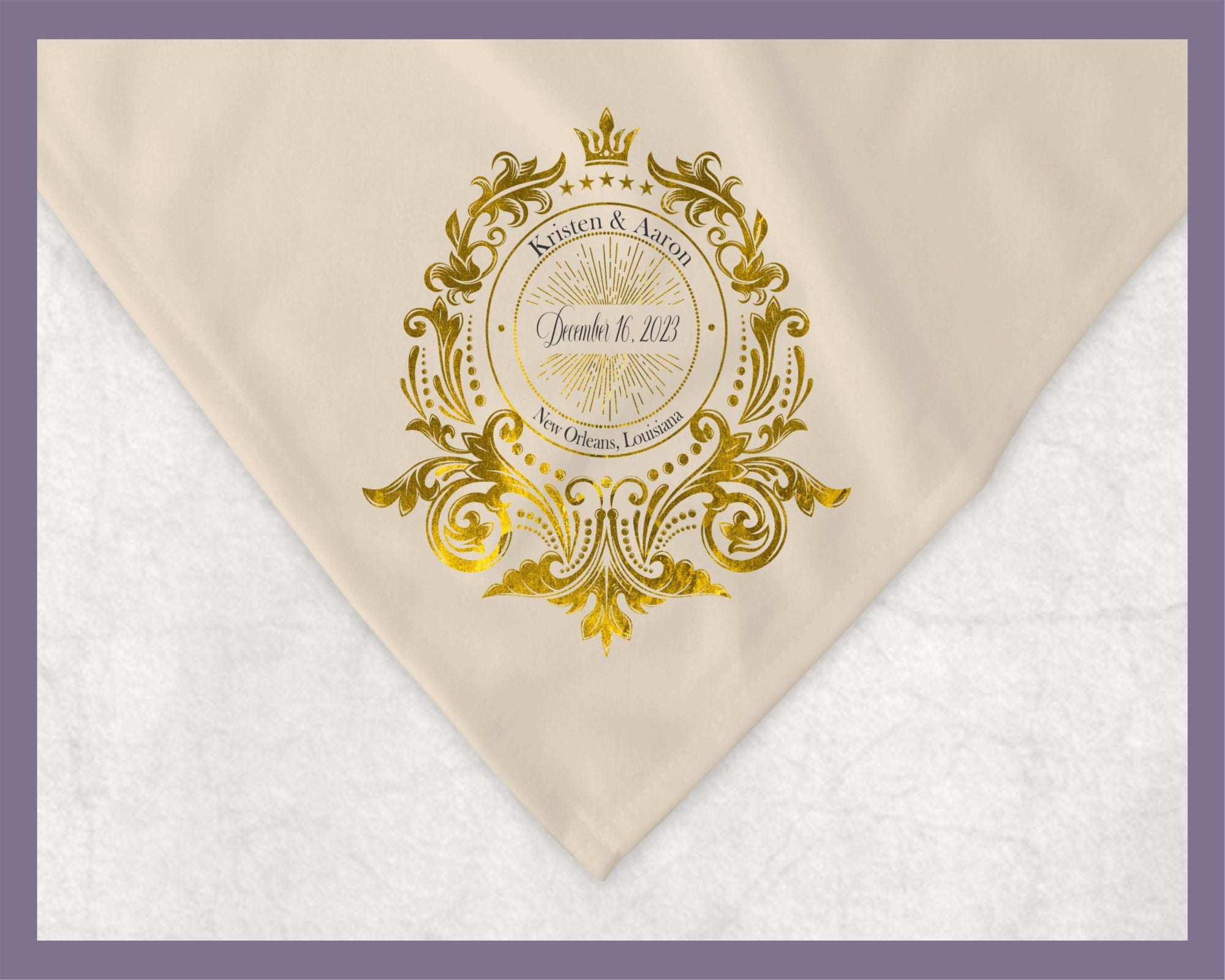 May include: A gold and white wedding blanket with a decorative design. The design includes a crown, stars, and the words &#39;Kristen & Aaron&#39;, &#39;December 16, 2023&#39;, and &#39;New Orleans, Louisiana&#39;.