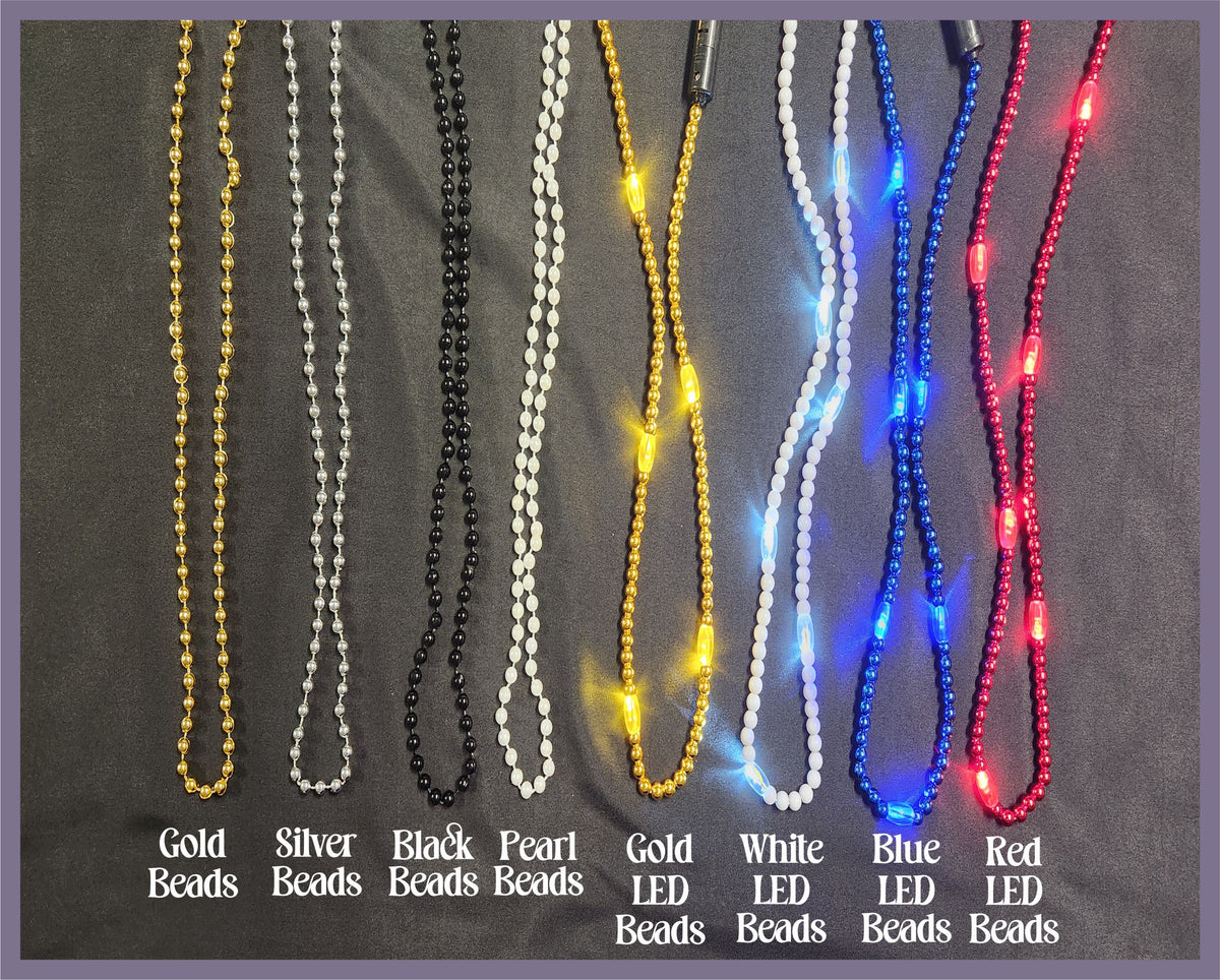 a collection of colorful beads, each with different colors and designs, arranged in a row.