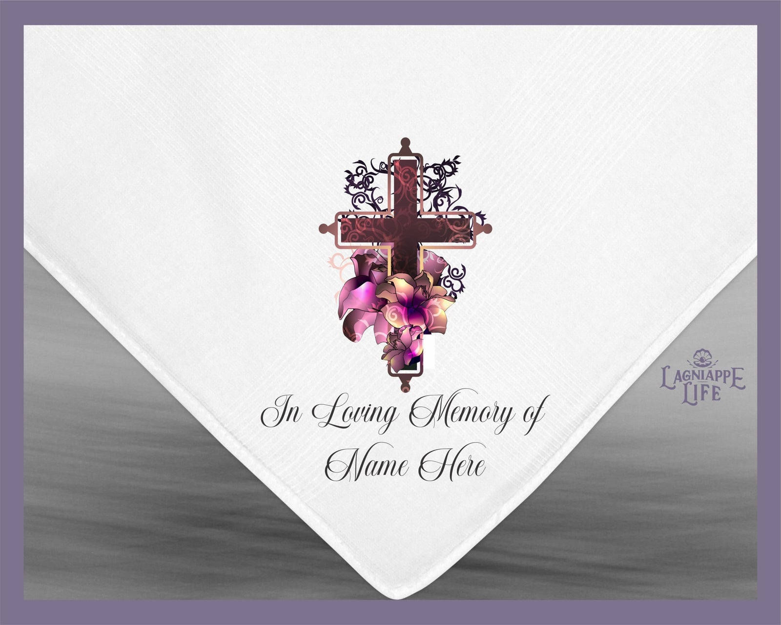 a white napkin with a cross and flowers on it