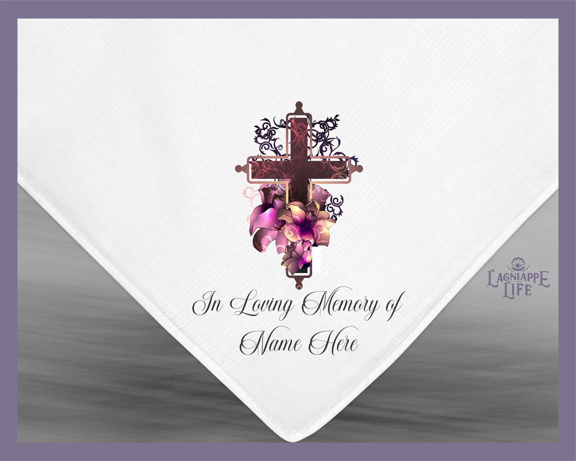 a white napkin with a cross and flowers on it